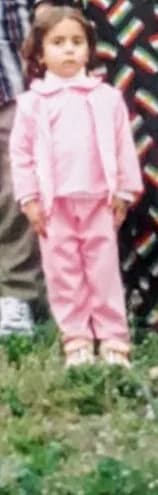 Whimsical Innocence: A Portrait of Childhood in Pink