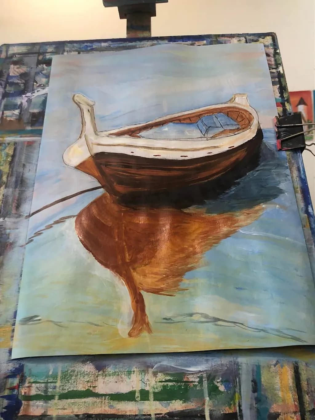 Serenity on Water: A Tranquil Reflection of a Wooden Boat