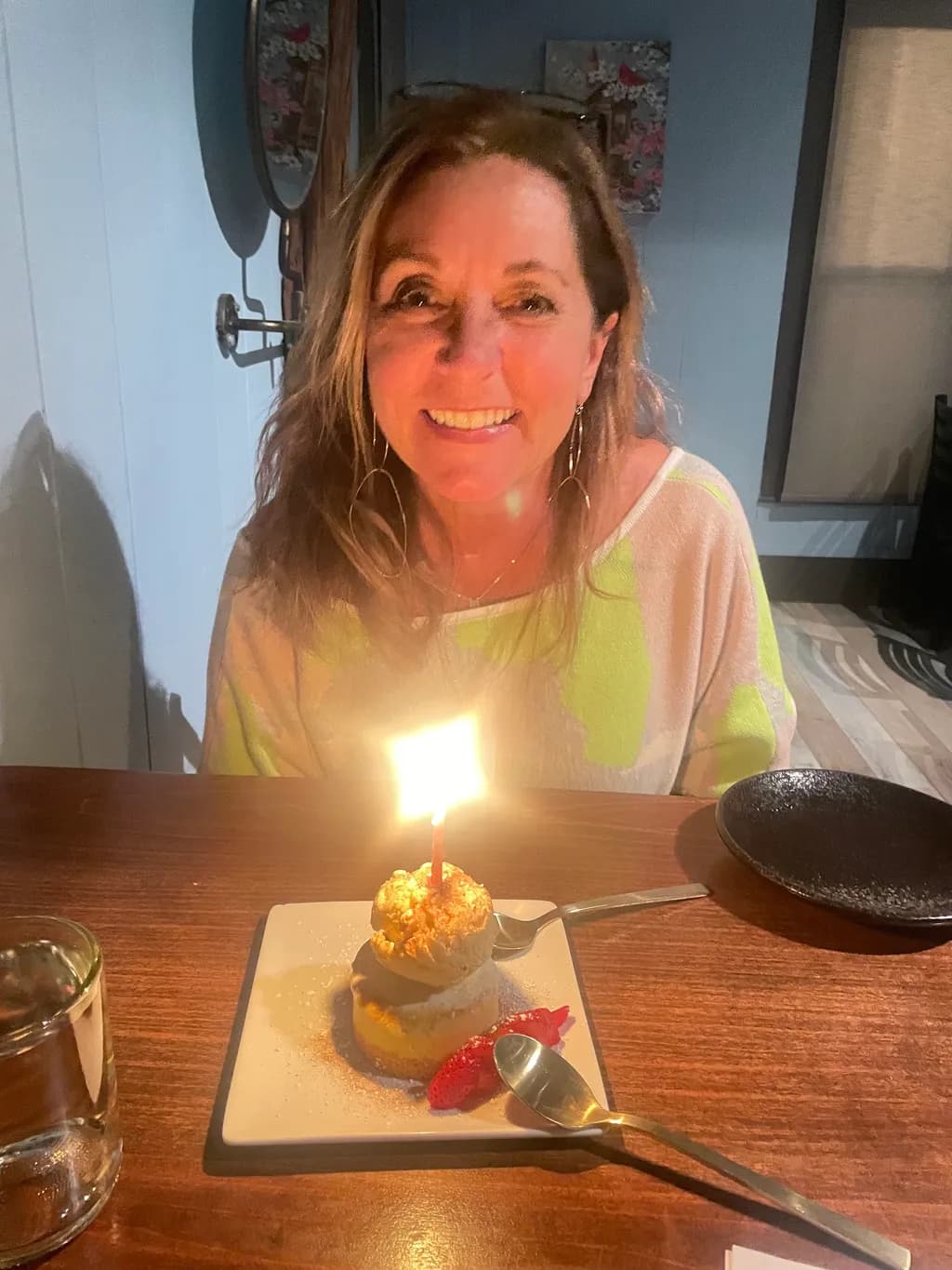 Joyful Celebration: A Moment of Sweet Delight with Birthday Cake and Candles