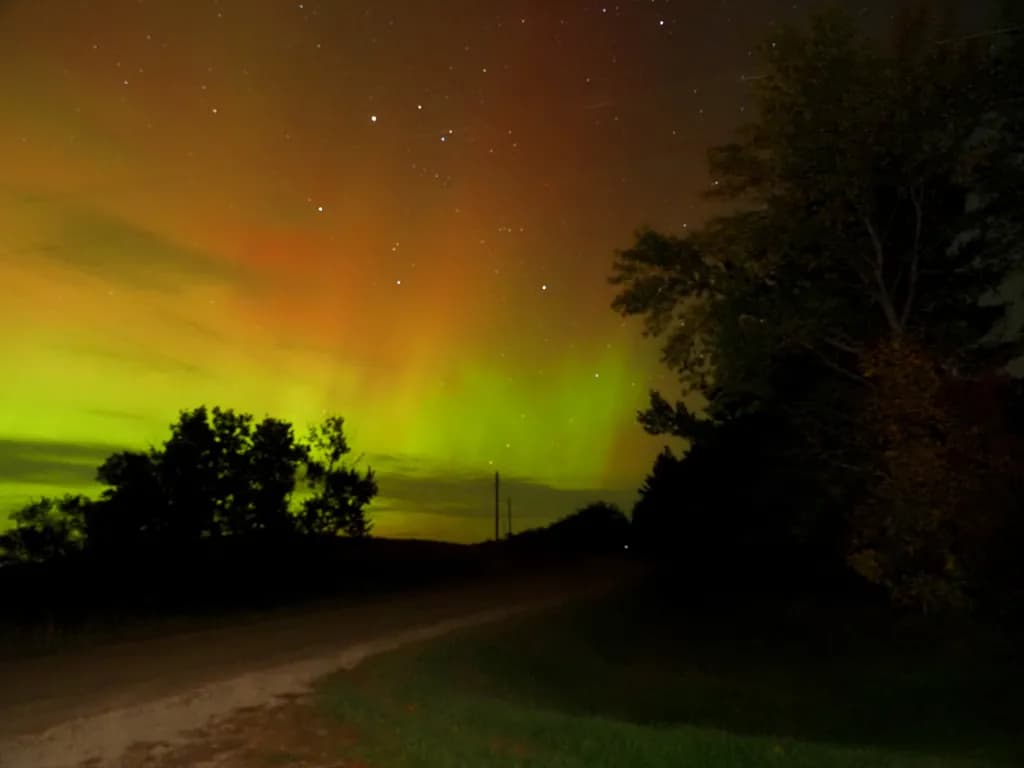 Whispers of the Aurora: A Night Sky Symphony in Vibrant Colors