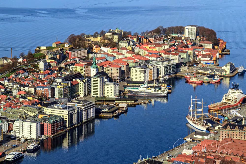 Serene Harbor: Aerial View of Coastal Charm and Vibrant Architecture