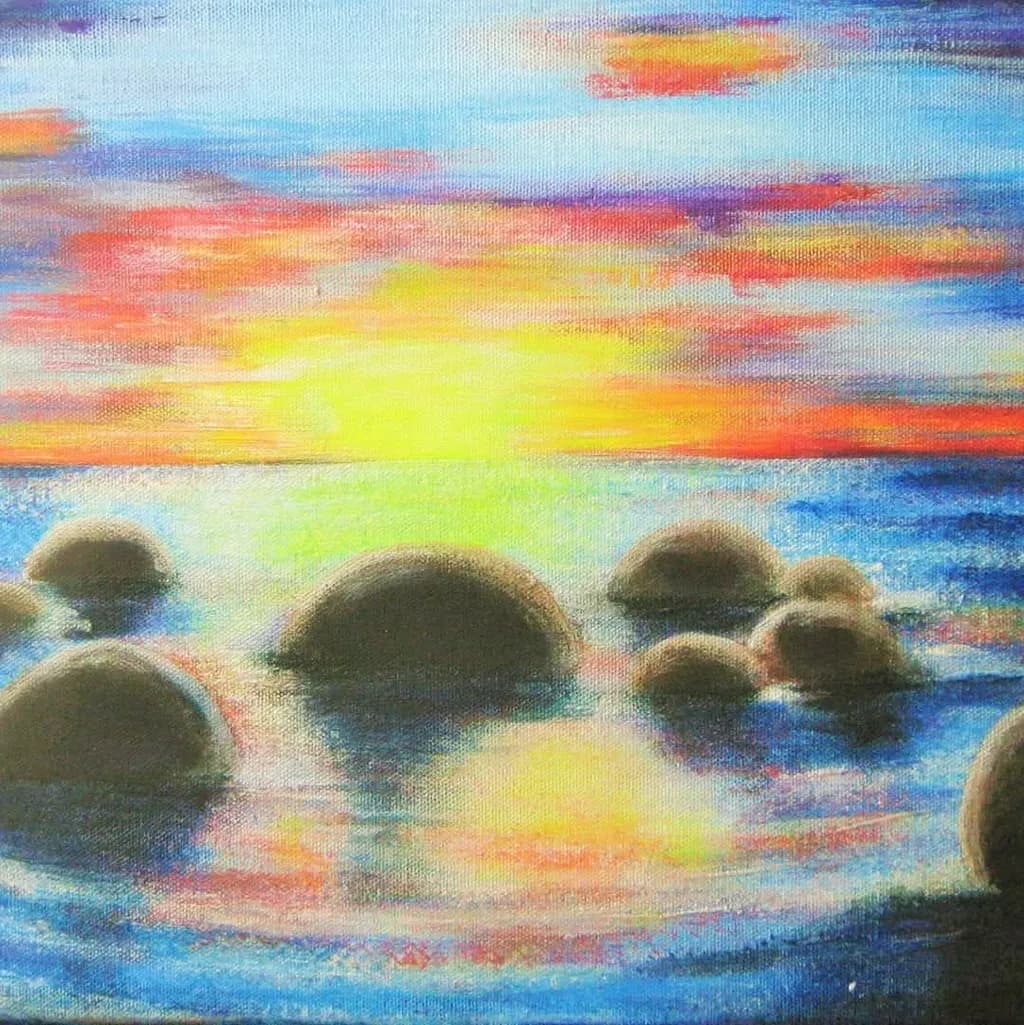 Serene Sunset Over Colorful Waters and Rocks