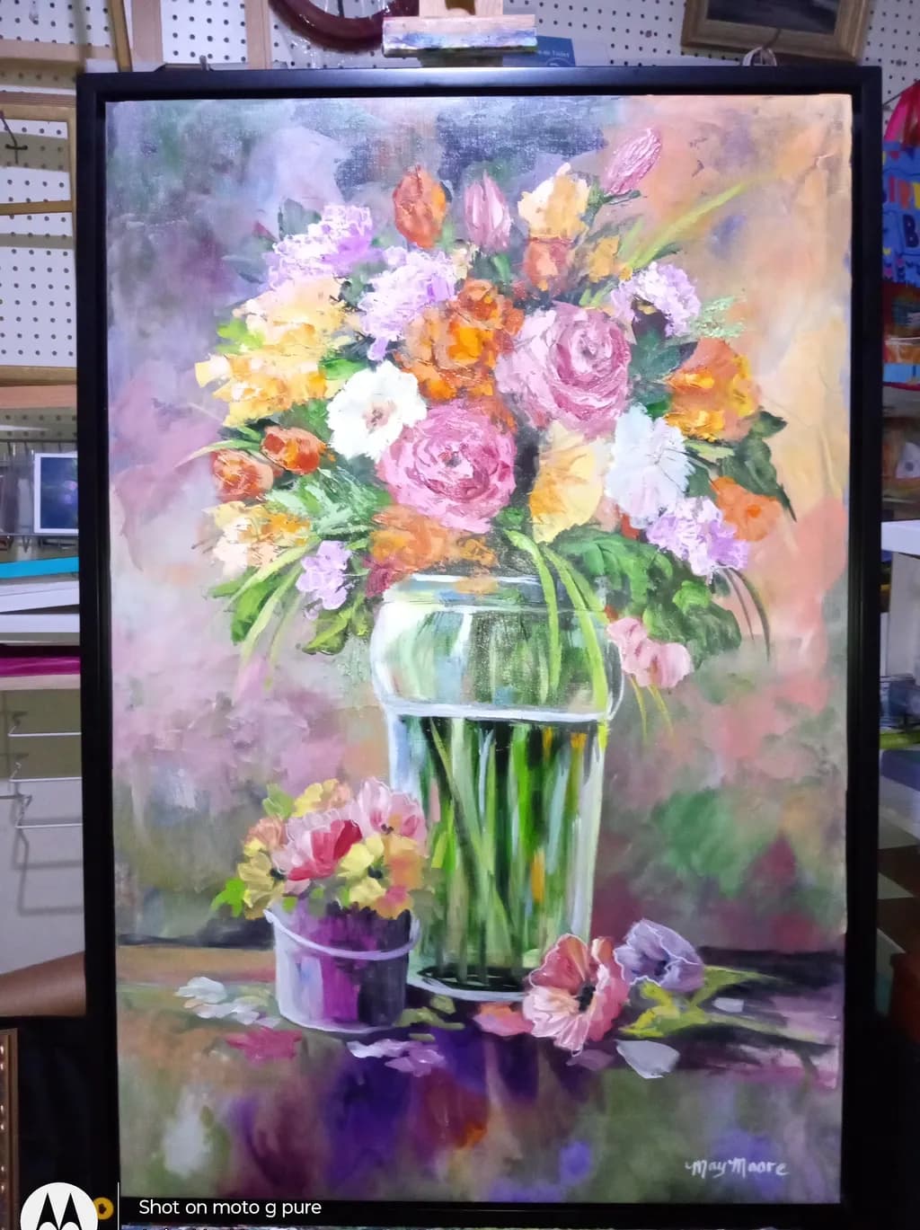 Vibrant Blossoms: A Lush Floral Still Life in Glass and Pottery