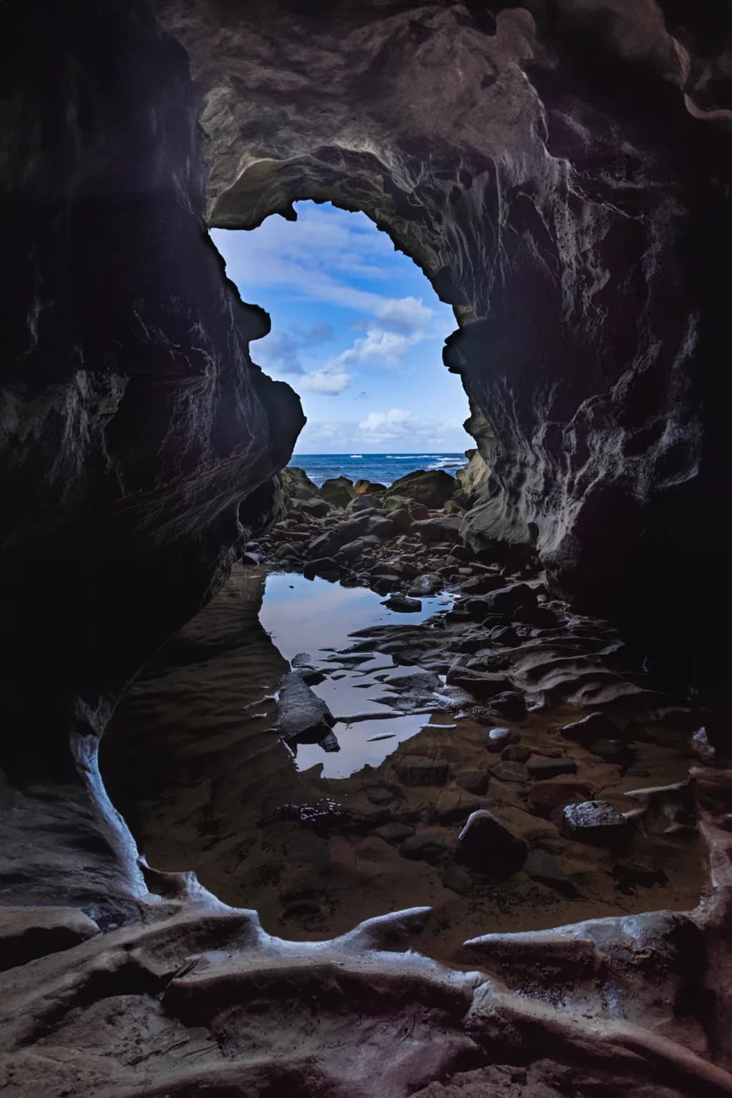 Reflections of Sky and Sea: A Cave's Secret View