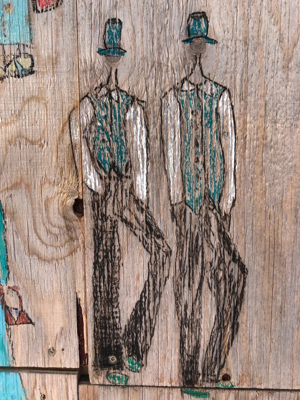 Dapper Duo: Whimsical Wood Art of Stylish Figures