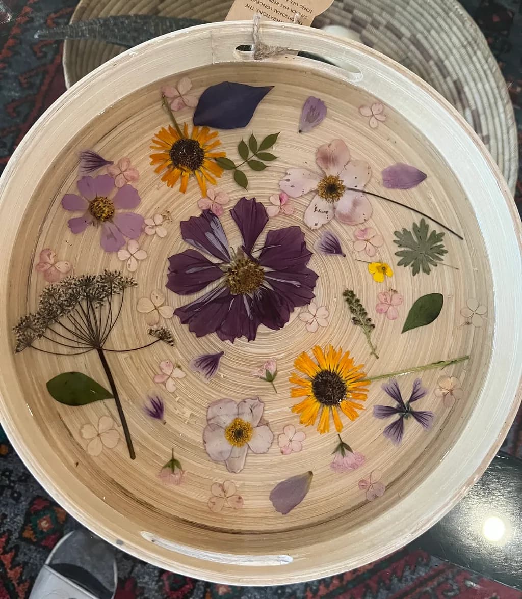 Ethereal Floral Harmony: A Serene Display of Pressed Blooms in Tranquil Waters
