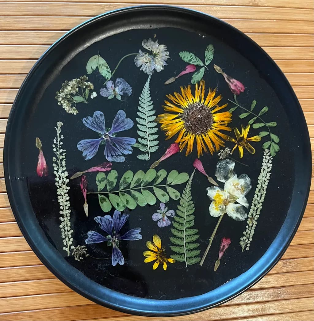 Floral Harmony: A Botanical Symphony on Black Enamel Tray