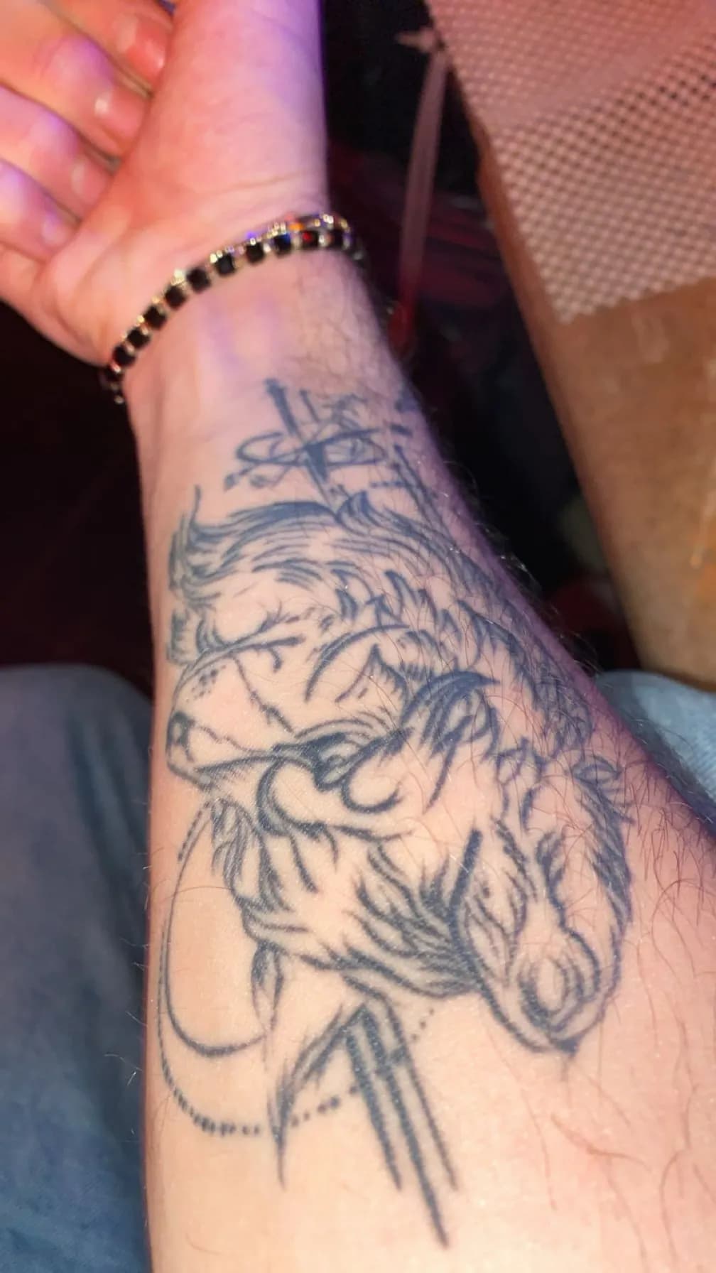 Eternal Embrace: A Bold Tattoo of Strength and Spirit