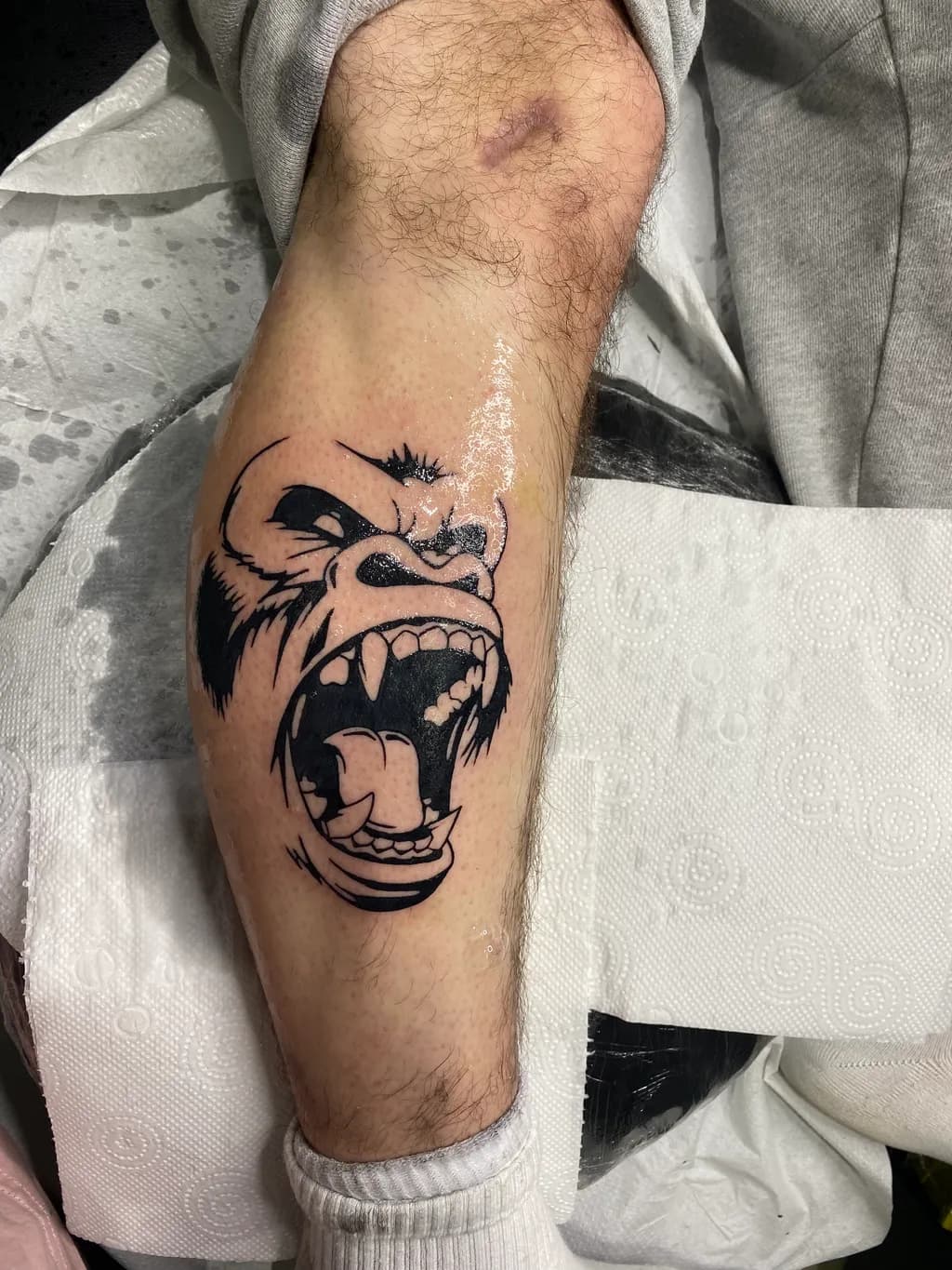 Fierce Roar: Bold Gorilla Tattoo Design for the Fearless