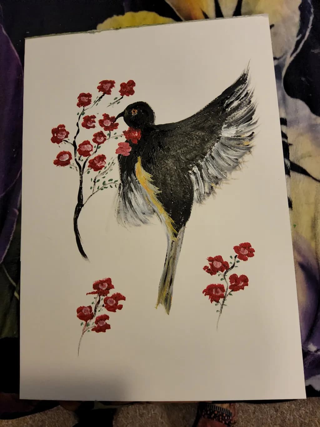 Whispers of Nature: A Black Bird Among Blossoms