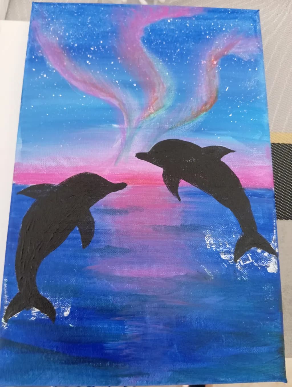 Dancing Dolphins Under a Cosmic Sky: A Vibrant Oceanic Dreamscape