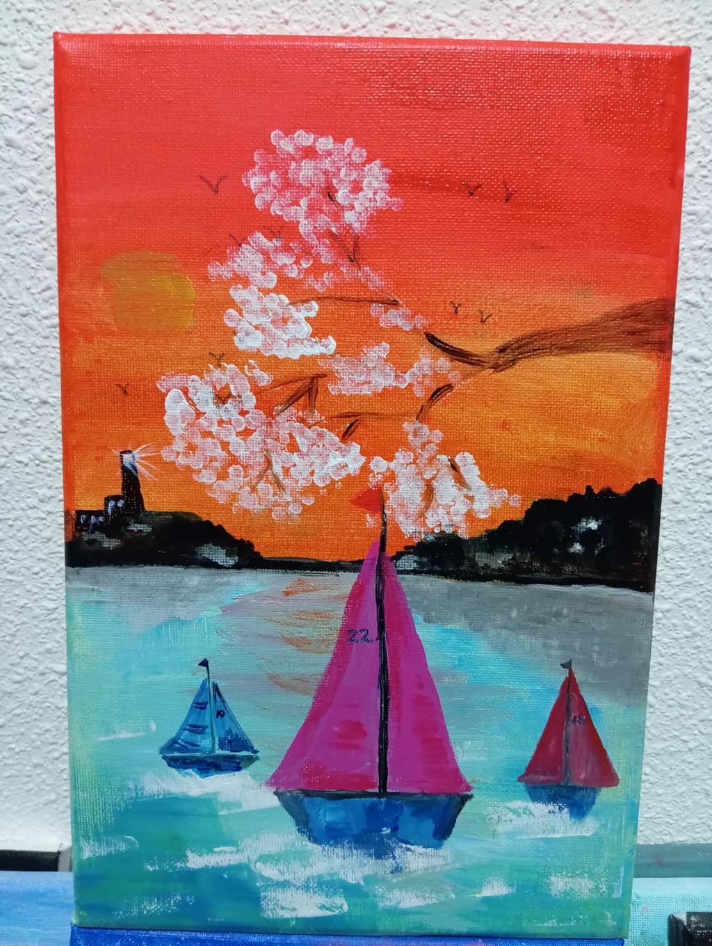 Whispers of Spring: Sailboats Under Cherry Blossom Skies at Sunset