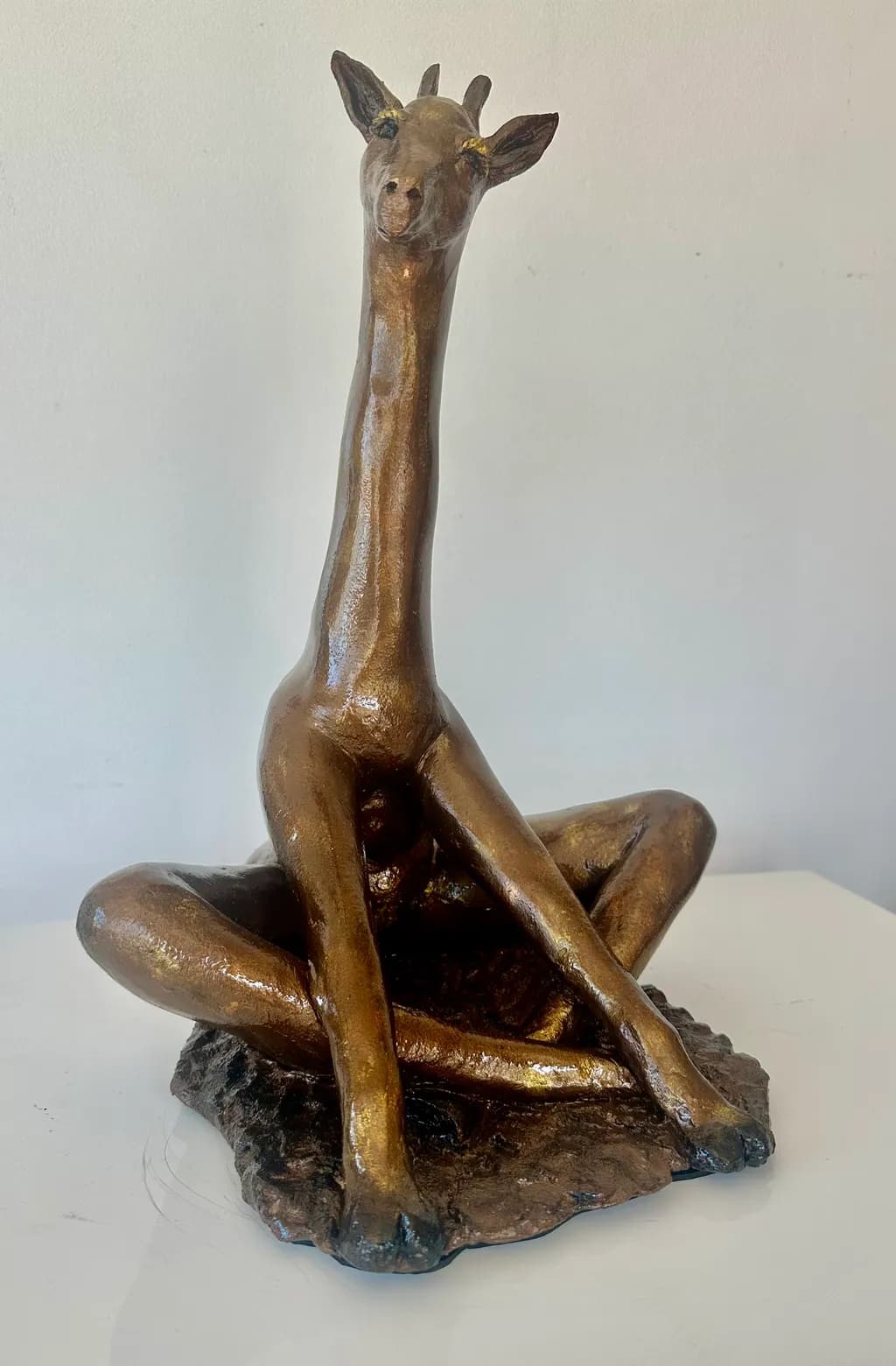 Whimsical Elegance: A Unique Bronze Giraffe Sculpture Embracing Creativity and Artistry