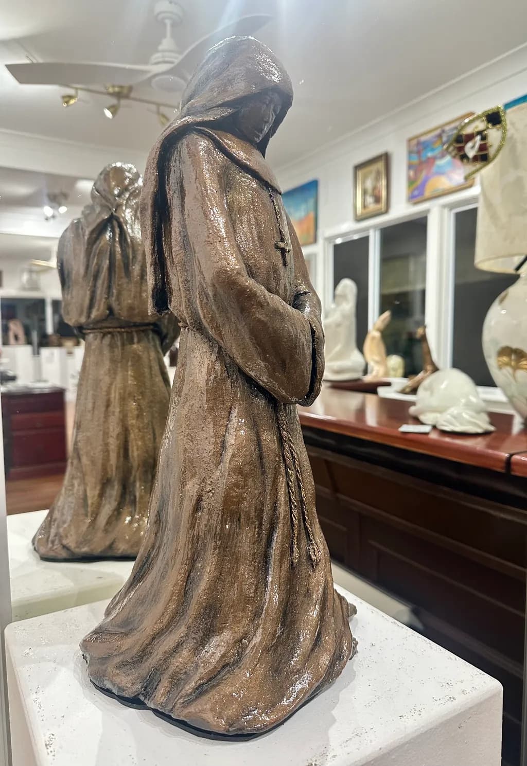 Whispers of Solitude: A Serene Monastic Figure in Earthy Tones