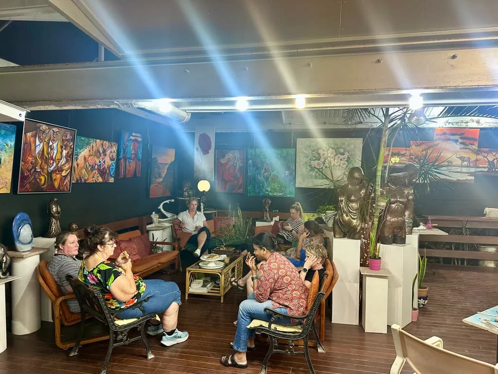 Artistic Conversations: A Vibrant Gathering in an Eclectic Gallery Space