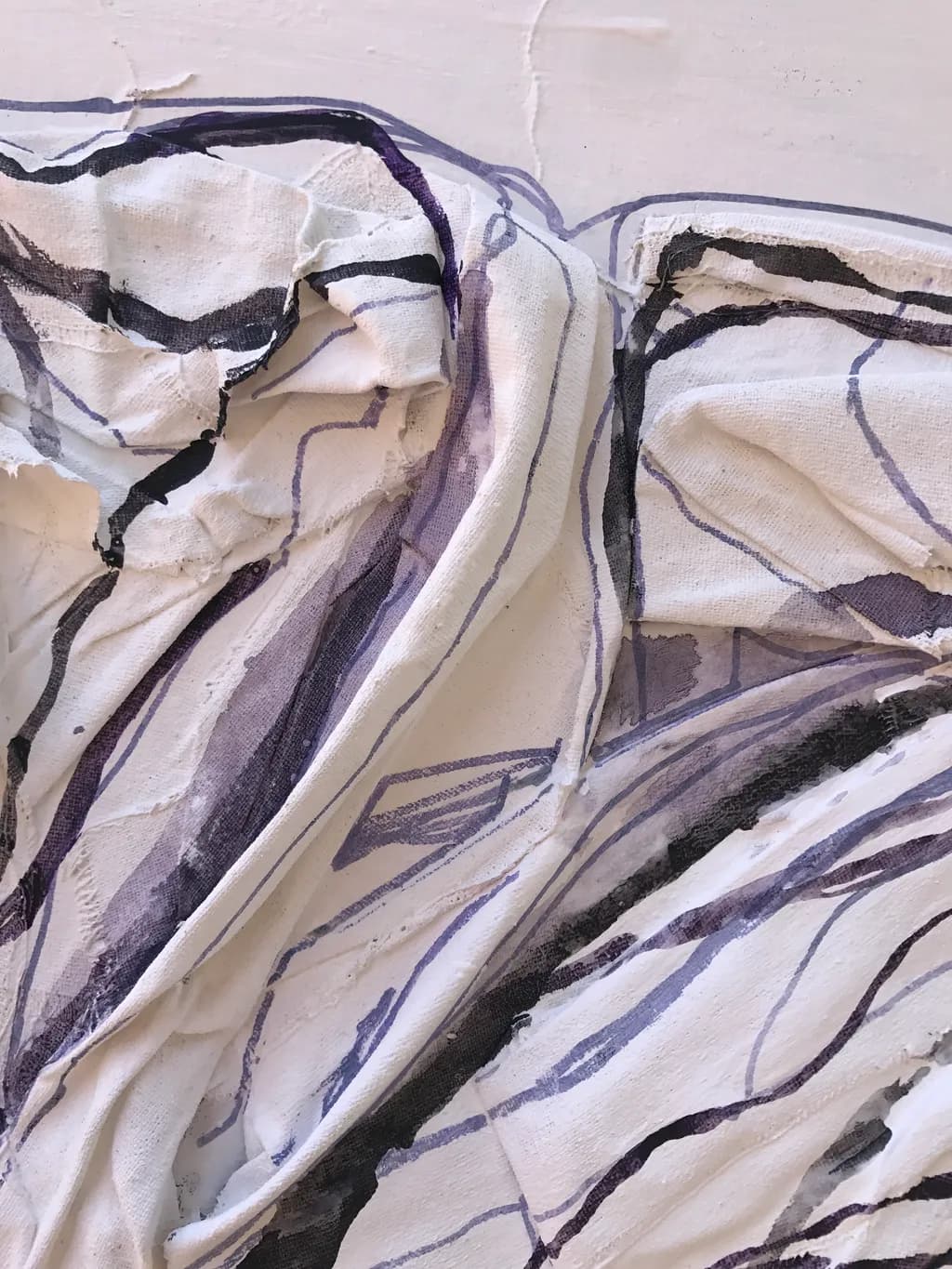 Whispers of Fabric: A Dance of Purple and White Textures