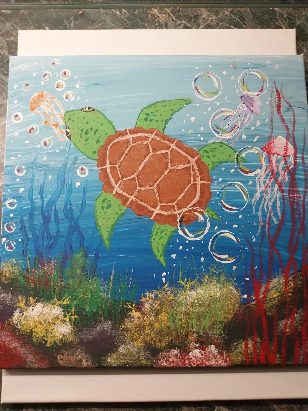 Serene Underwater Dance: A Colorful Turtle's Journey Through Jellyfish and Bubbles