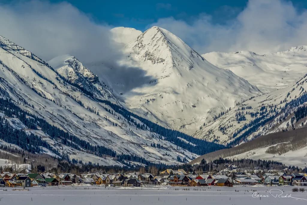 Snowy Peaks and Village
