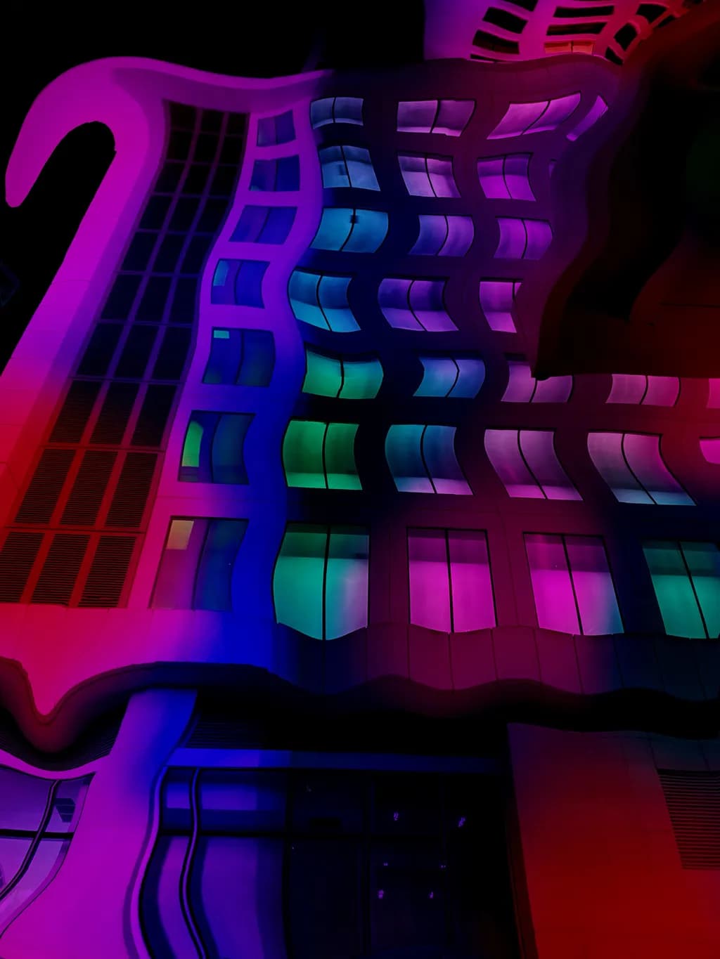 Vibrant Nightscape: Abstract Architecture in Neon Curves