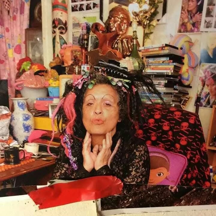 Whimsical Portrait of a Creative Spirit: Embracing Color and Chaos in Everyday Life