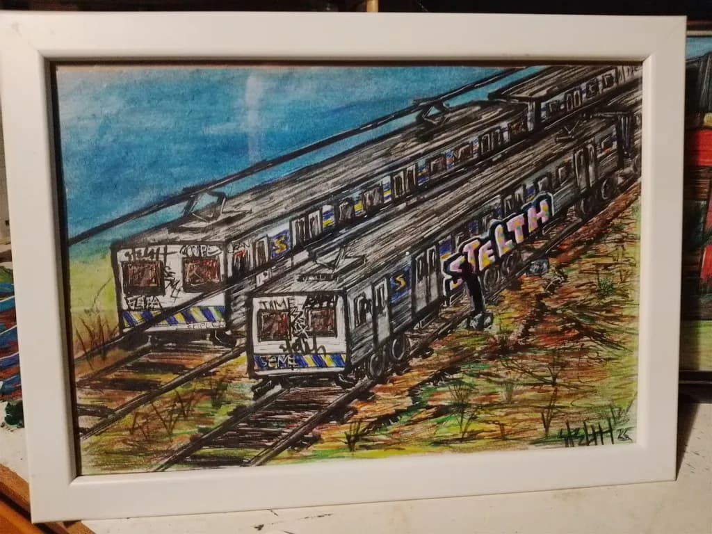 Urban Symphony: The Colorful Dance of Graffiti Trains on Tracks