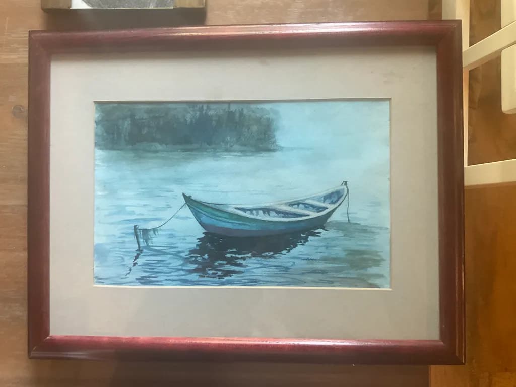 Serenity on Water: A Tranquil Boat Reflection in Soft Hues