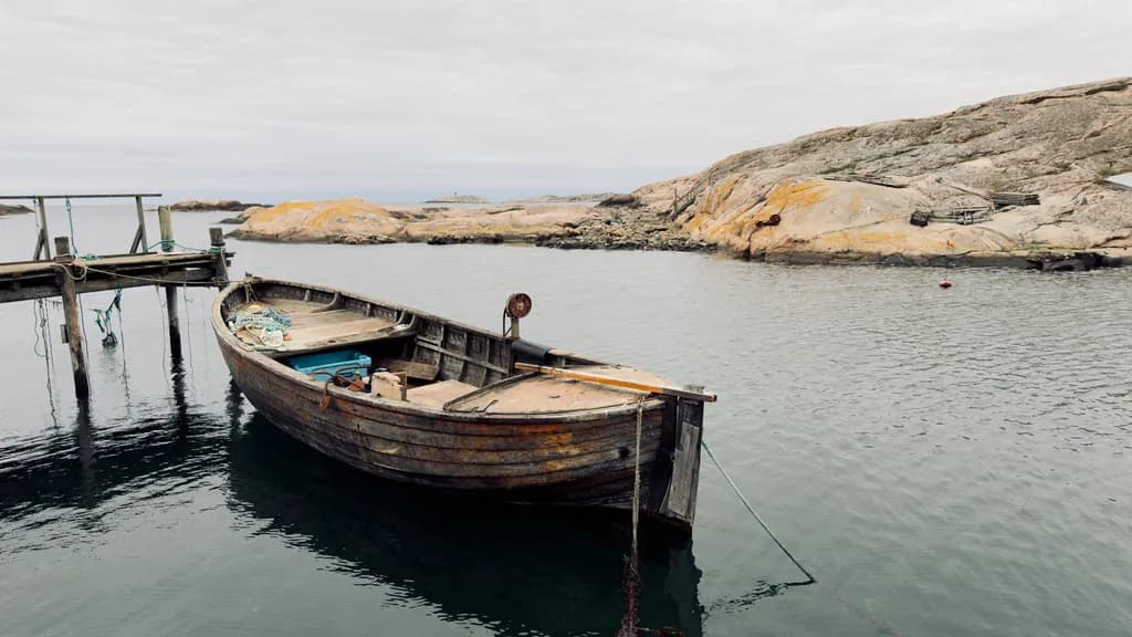 Whispers of the Sea: A Weathered Boat's Journey Through Time