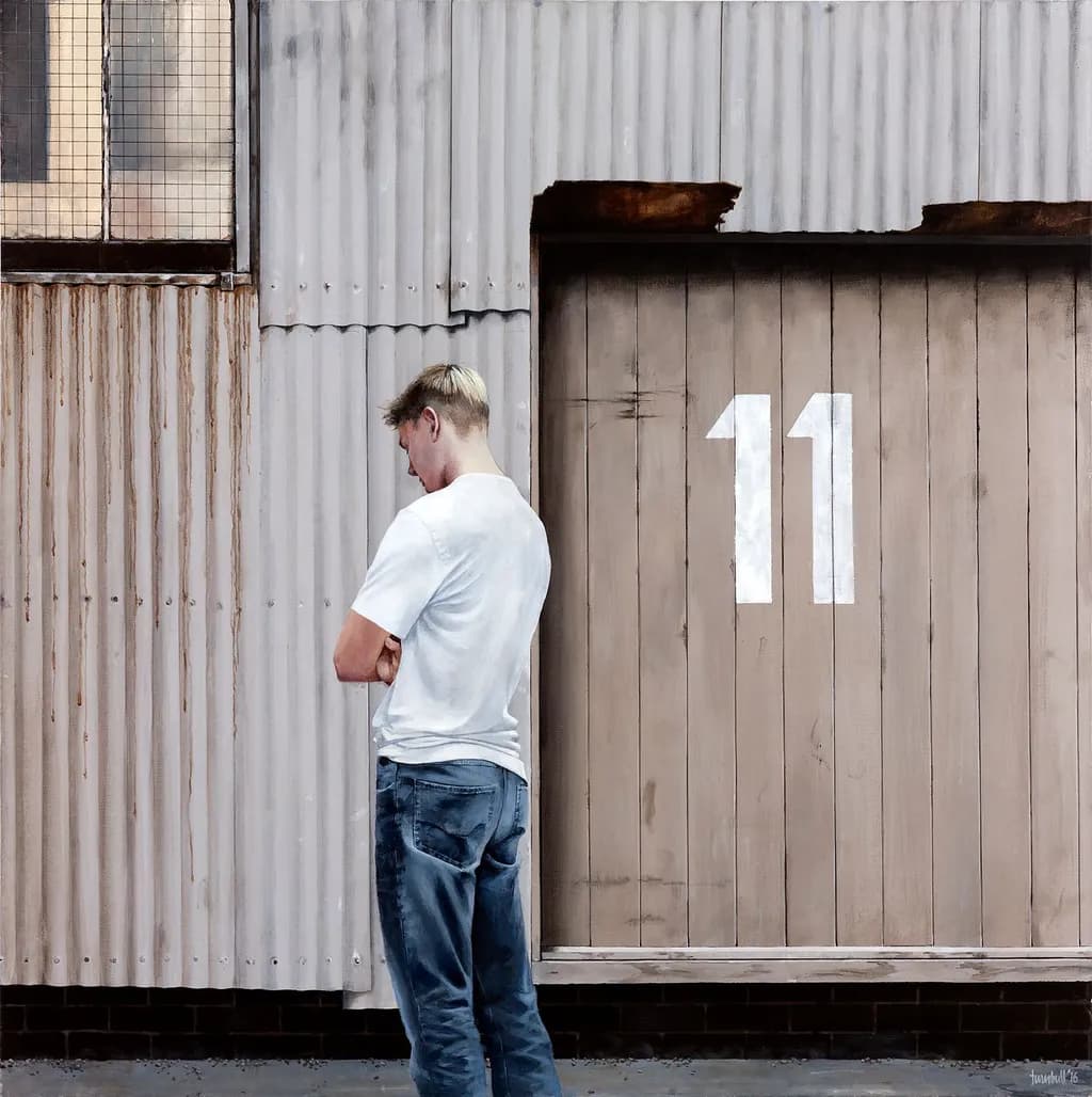 Man by Number 11 Wall