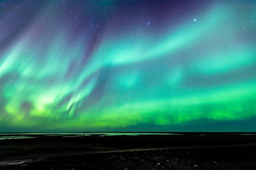 Whispers of the Aurora: A Night Sky Symphony in Vibrant Colors