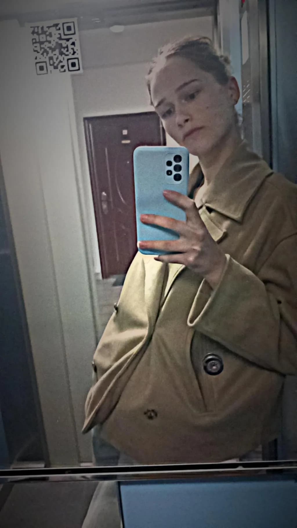 Reflections of Self: A Modern Portrait in a Cozy Coat