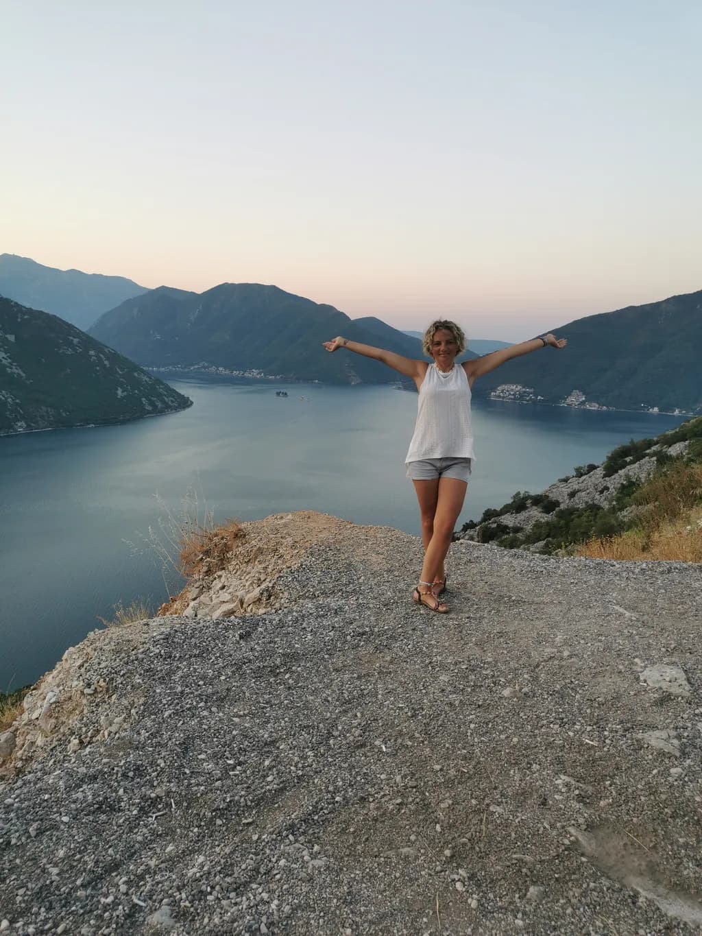 Embracing Freedom: A Serene Moment Overlooking the Adriatic Coastline