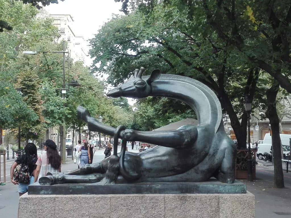 Whimsical Reverie: The Enigmatic Giraffe Sculpture in Urban Serenity