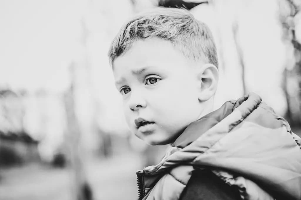 Whispers of Innocence: A Black and White Portrait of Childhood Wonder