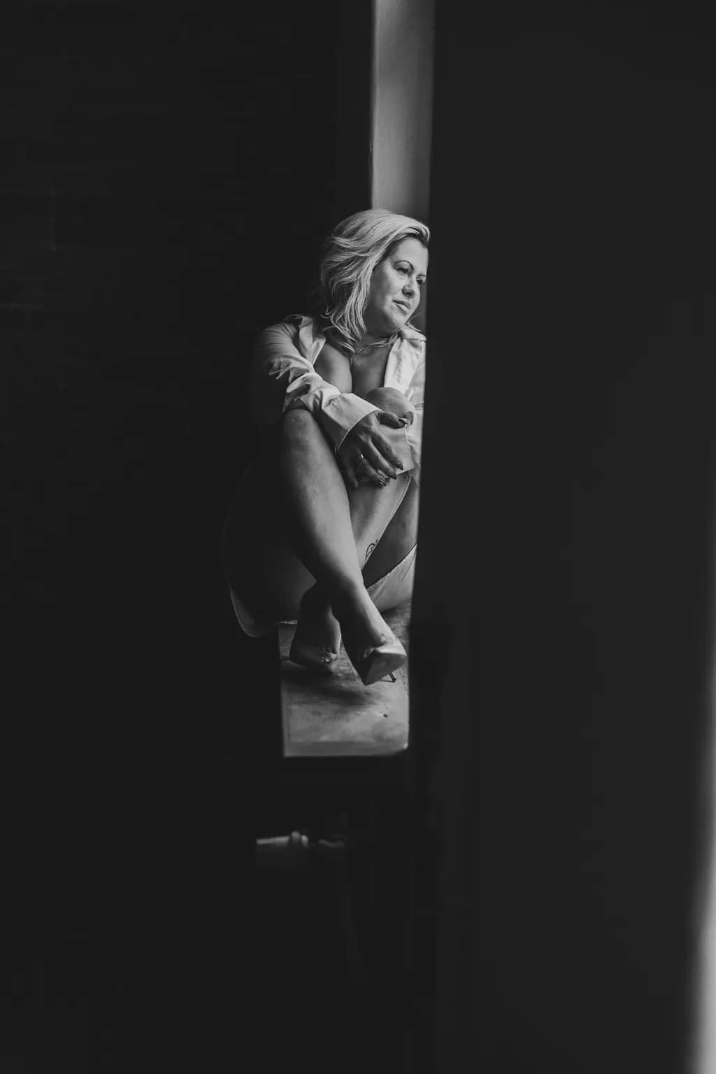 Whispers of Solitude: A Dance of Light and Emotion in Introspection