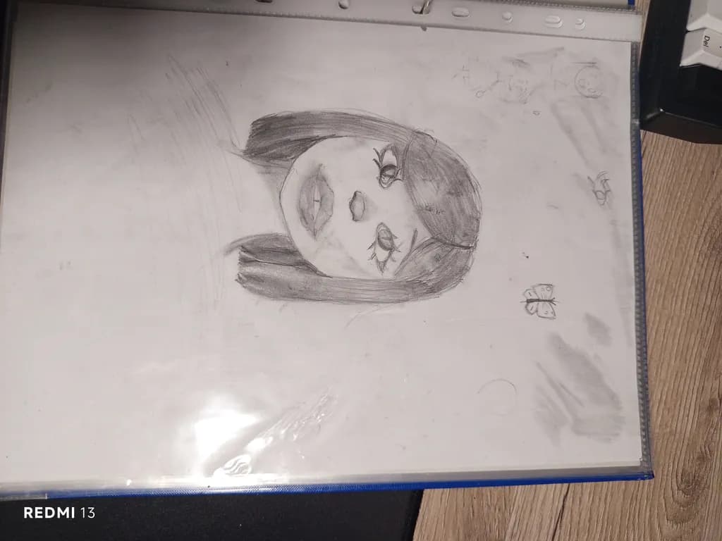 Whispers of Innocence: A Portrait Sketch Capturing Youthful Dreams