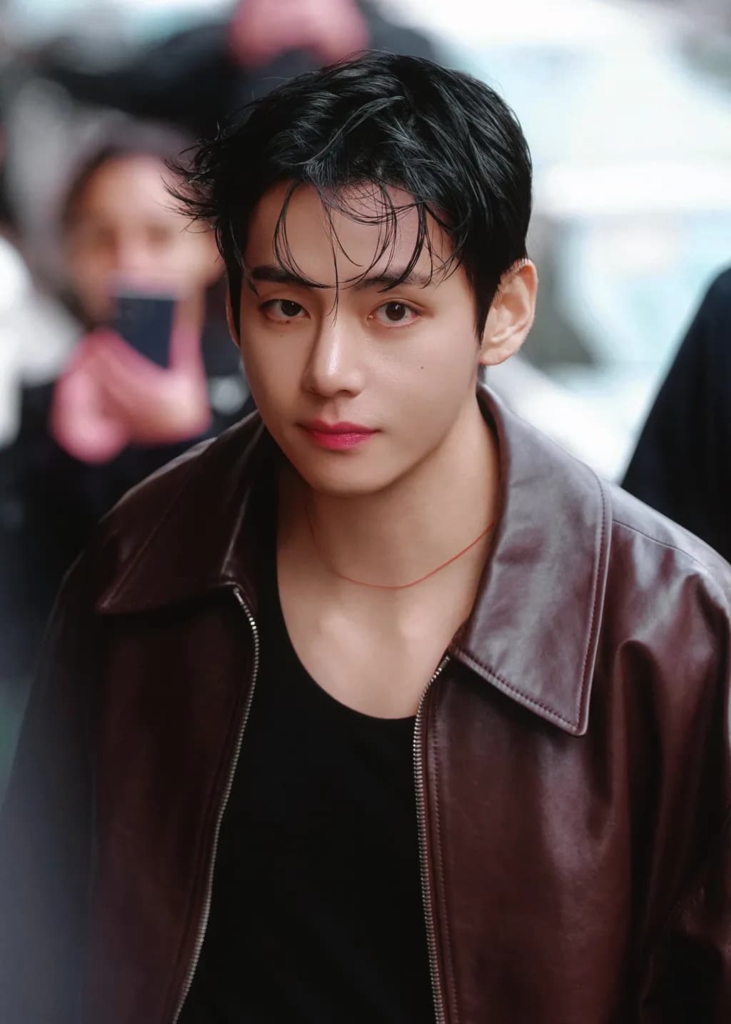 Captivating Gaze: A Moment of Urban Elegance