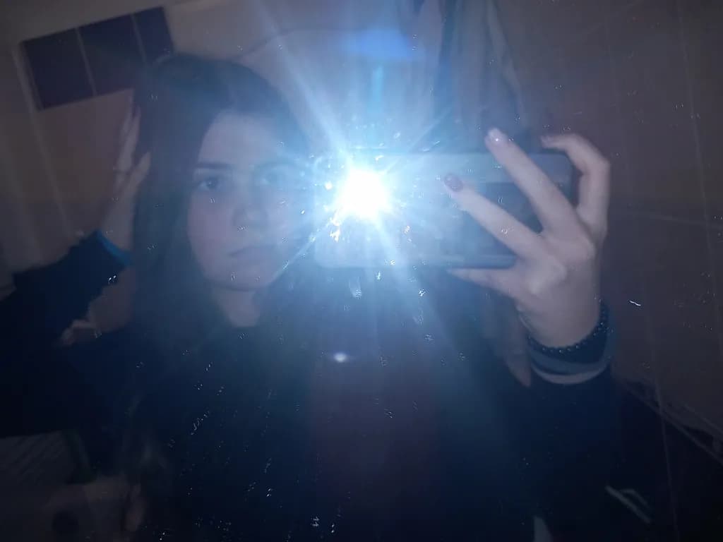 Reflections of Self: A Flash of Expression in the Mirror