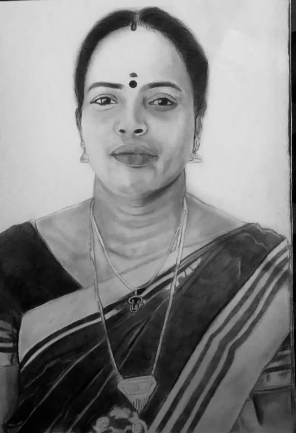 Elegance in Monochrome: A Traditional Portrait of Graceful Femininity in Saree and Jewelry