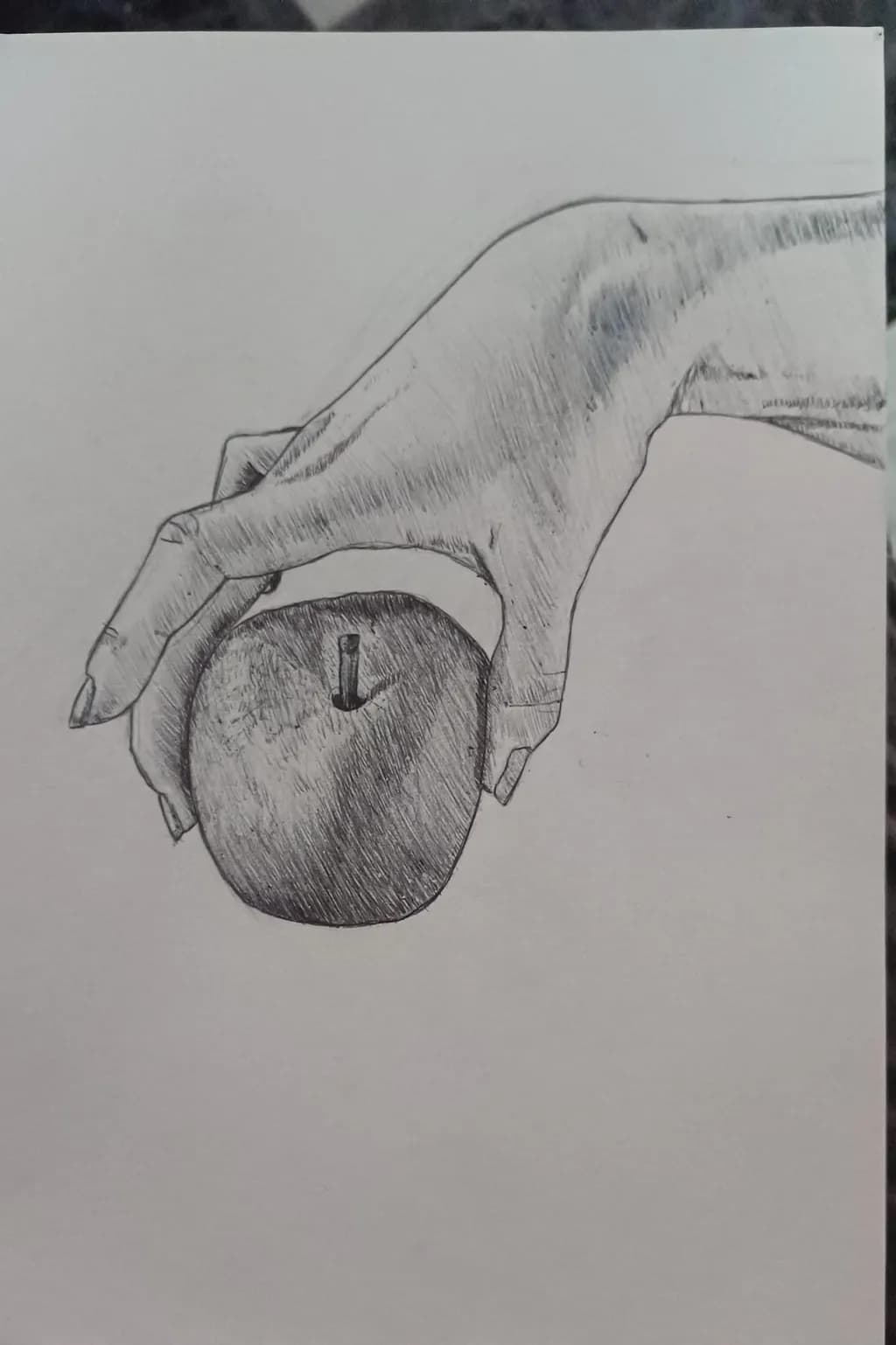 Whispers of Nature: A Hand Cradling an Apple in Delicate Detail
