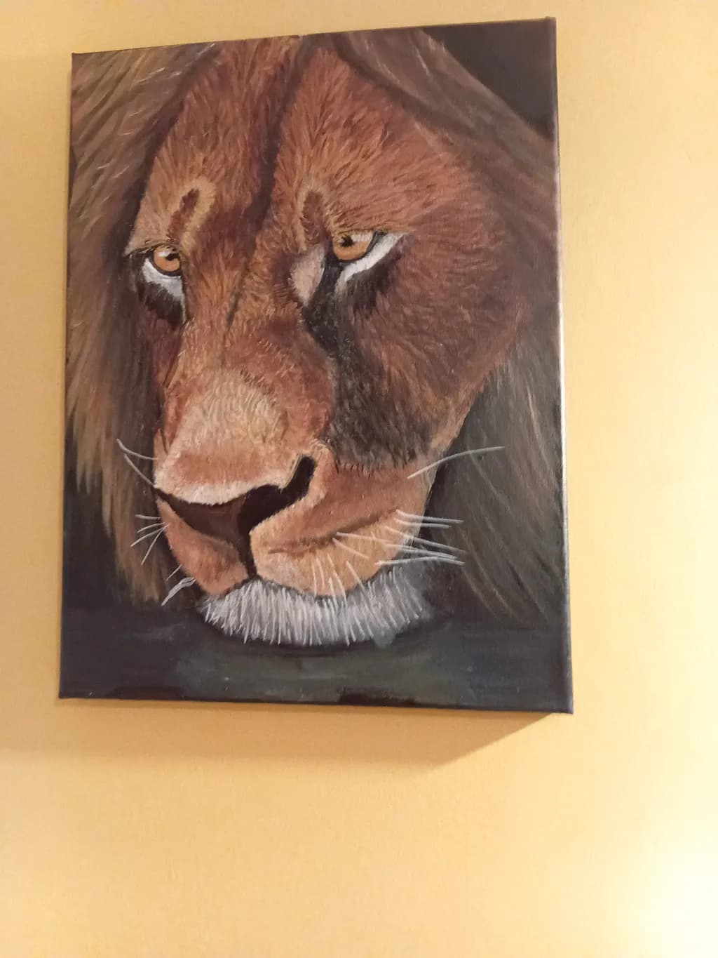 Majestic Gaze: A Close-Up Portrait of a Lion's Strength and Grace