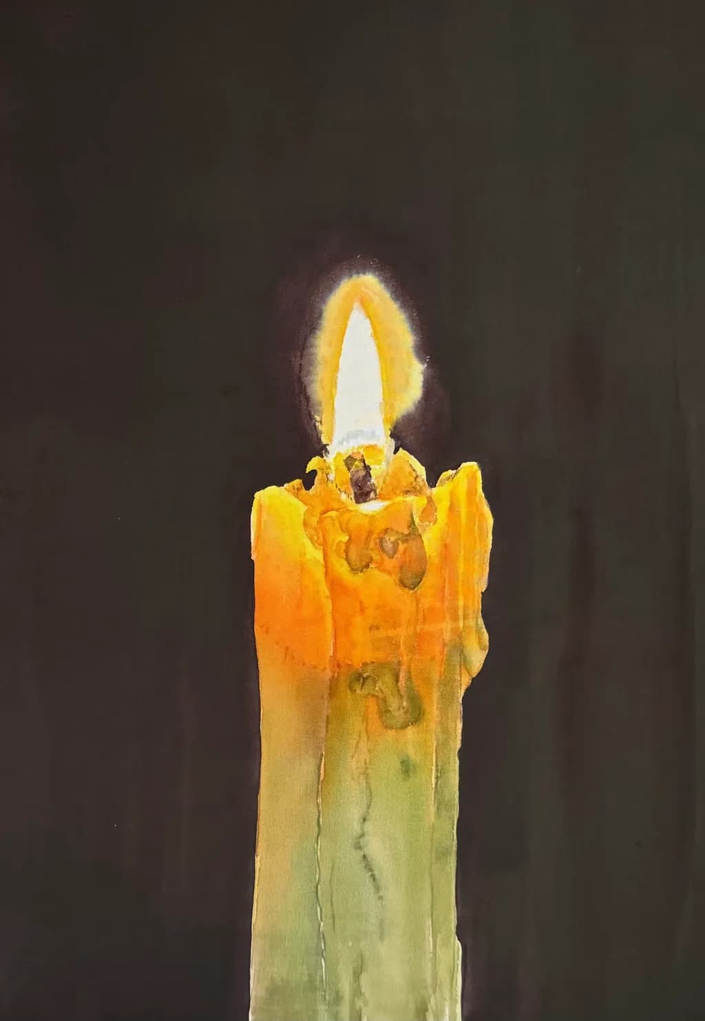 Illuminated Serenity: A Candle's Gentle Glow in Contrast