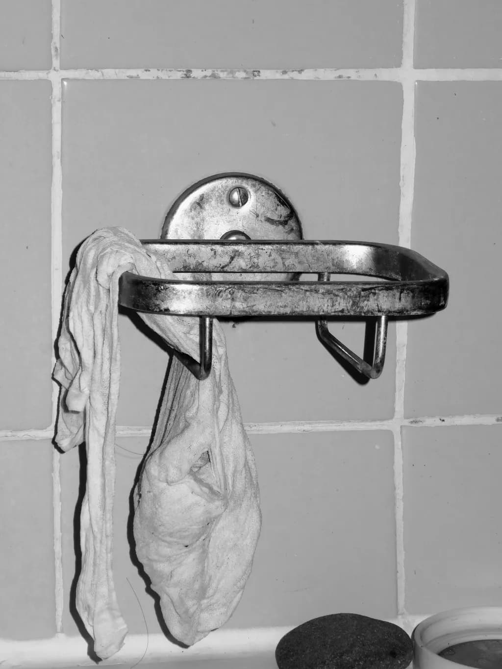 Rustic Reflections: The Beauty of Everyday Imperfections in a Bathroom Shelf Scene