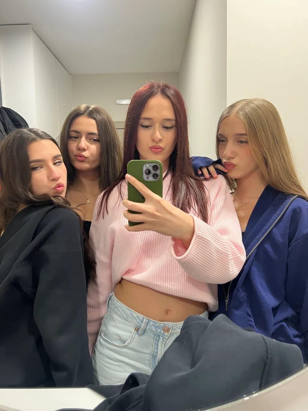 Playful Reflections: A Youthful Selfie of Friendship and Fashion