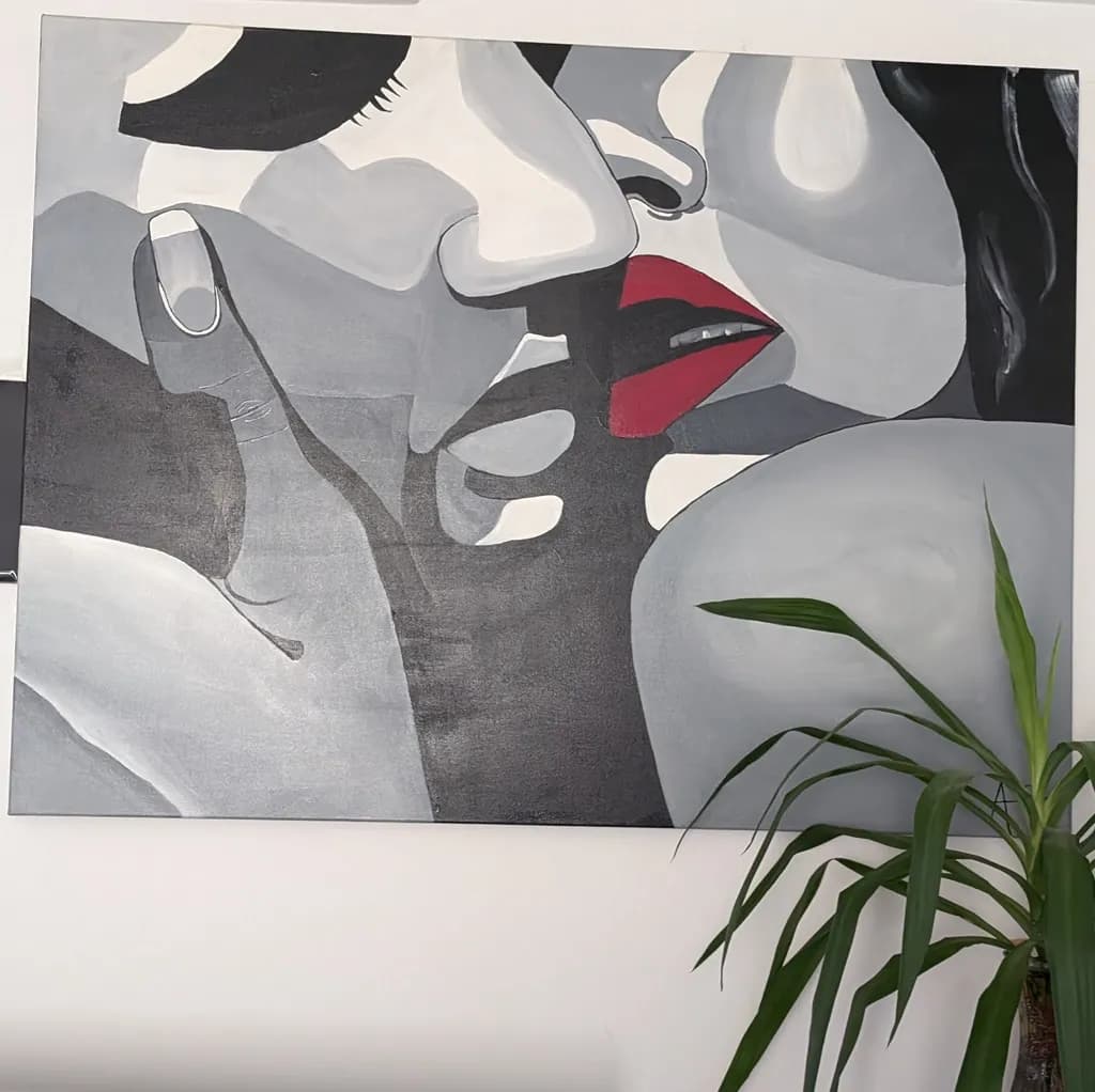 Whispers of Passion: A Monochrome Embrace in Bold Red Accents