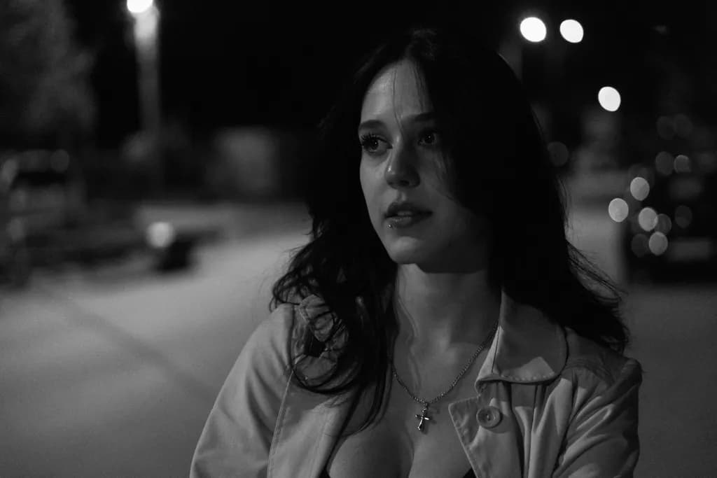 Whispers of the Night: A Portrait of Solitude in Black and White