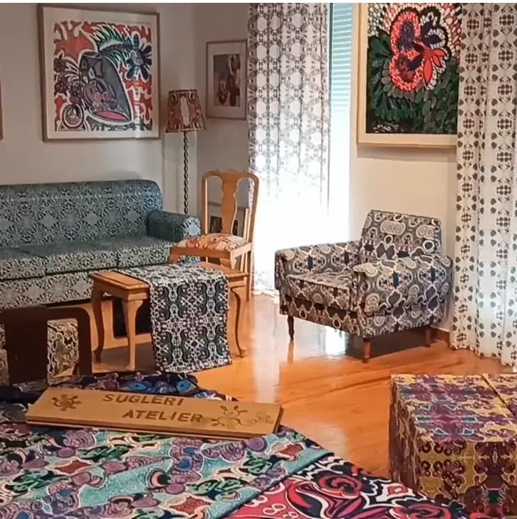 Vibrant Harmony: A Colorful Fusion of Art and Comfort in a Cozy Atelier Space
