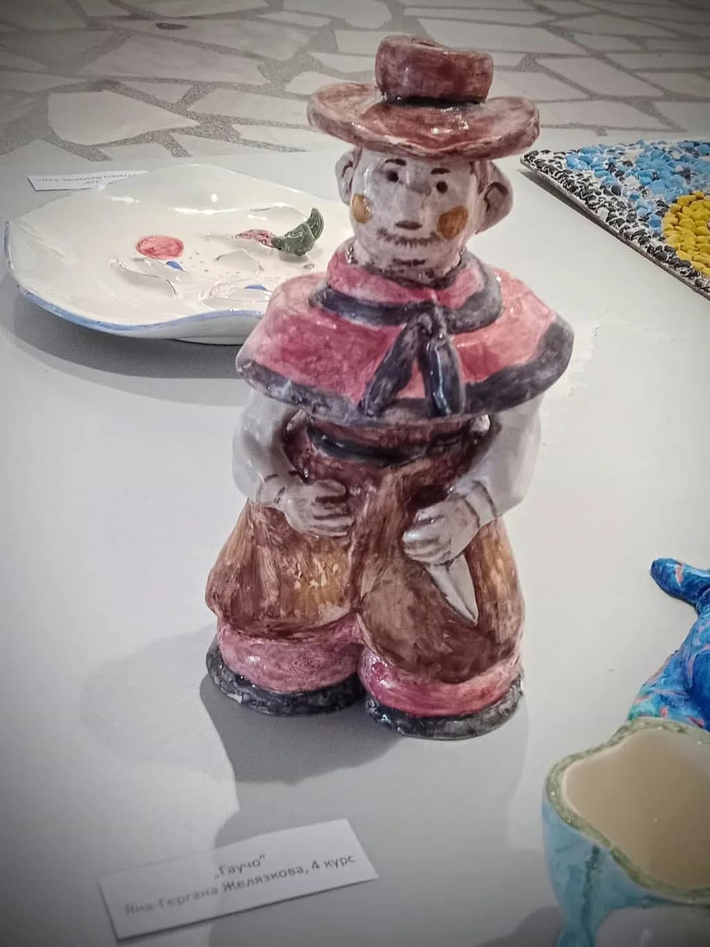 Whimsical Cowboy Figurine: A Charming Ceramic Sculpture Celebrating Rustic Heritage and Craftsmanship