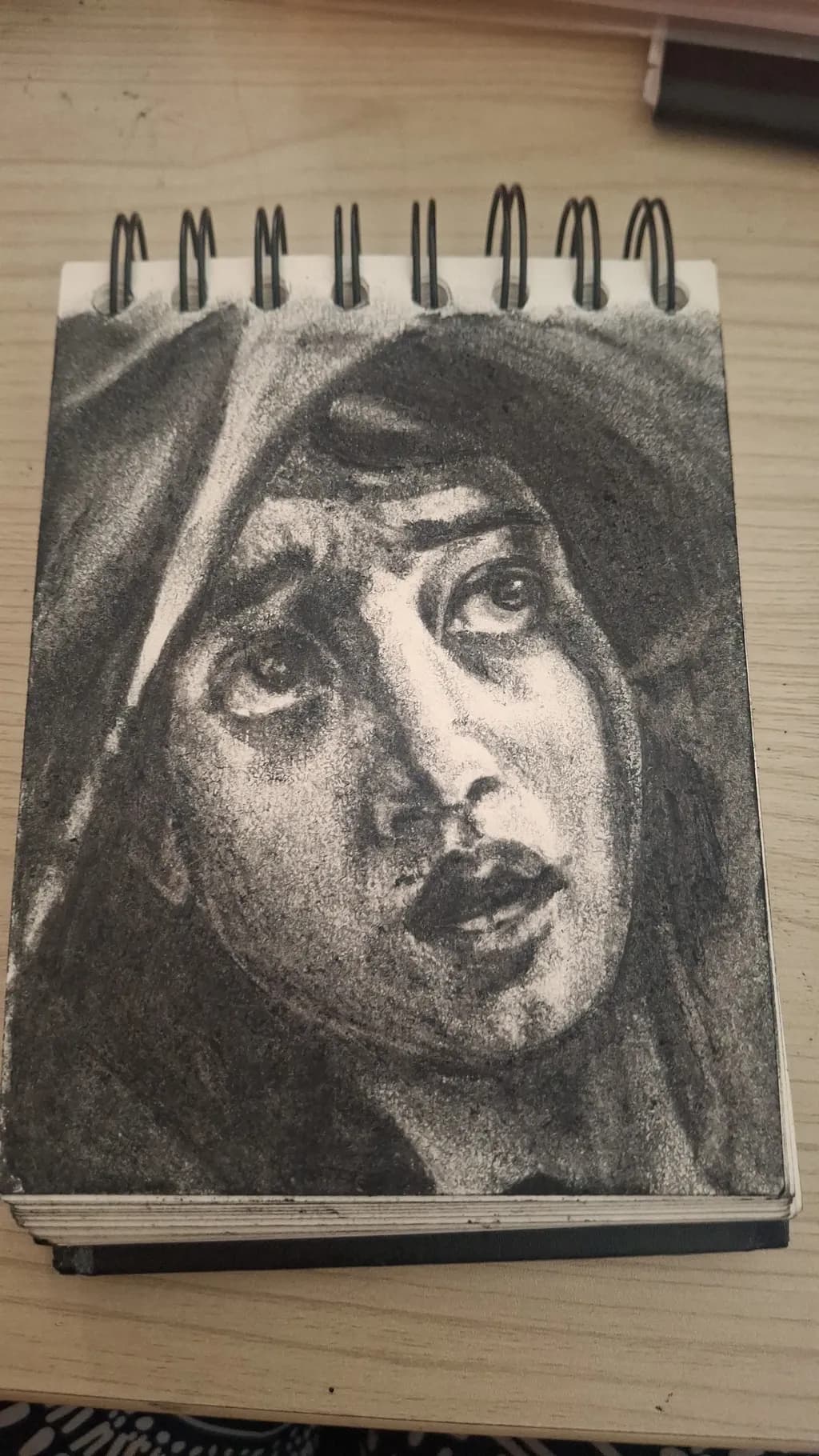 Whispers of Longing: A Charcoal Portrait of Emotion