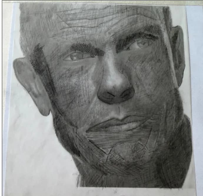 Intense Gaze: A Charcoal Portrait of Resilience and Depth