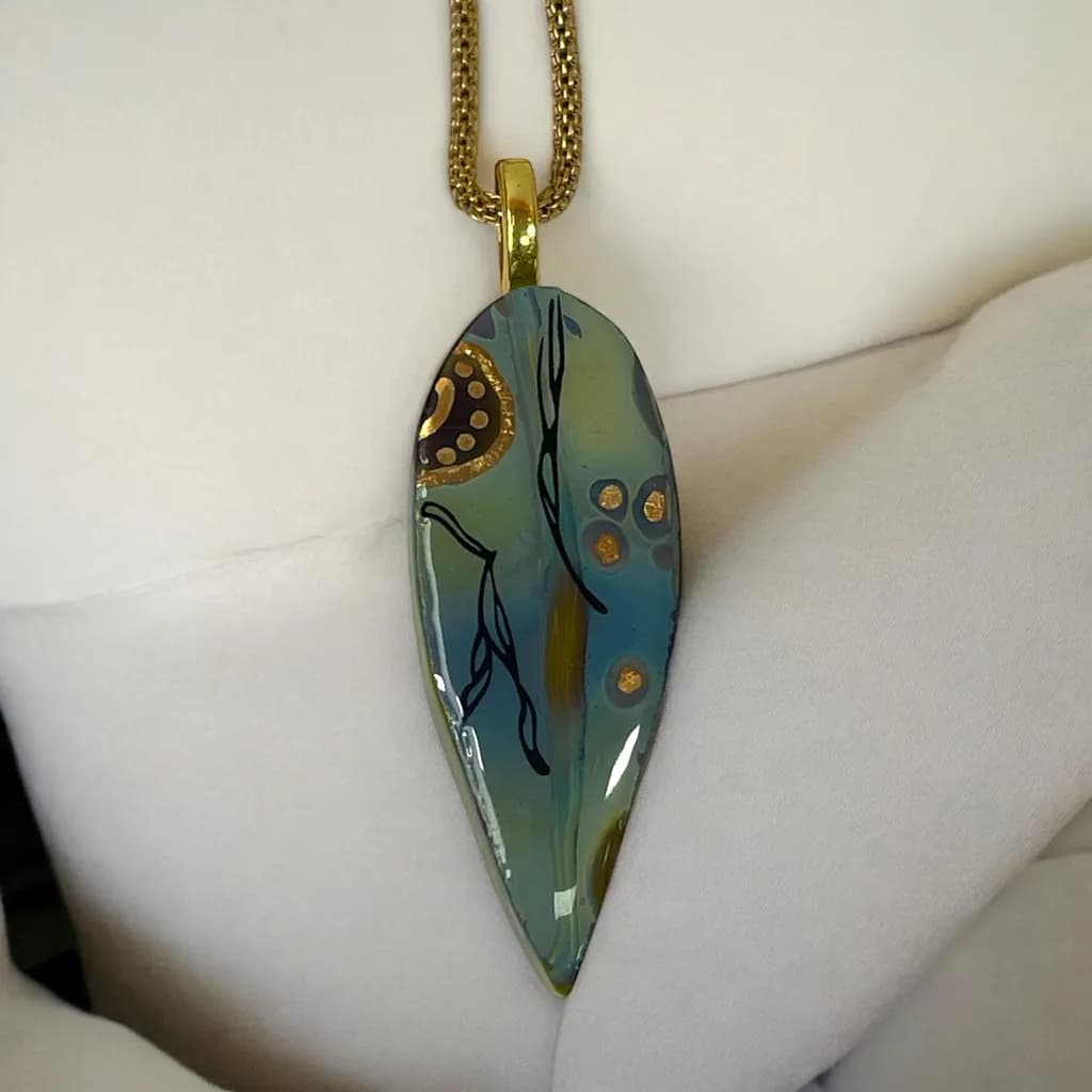 Dichroic Elegance: Handcrafted Glass Pendant with Gold Accents